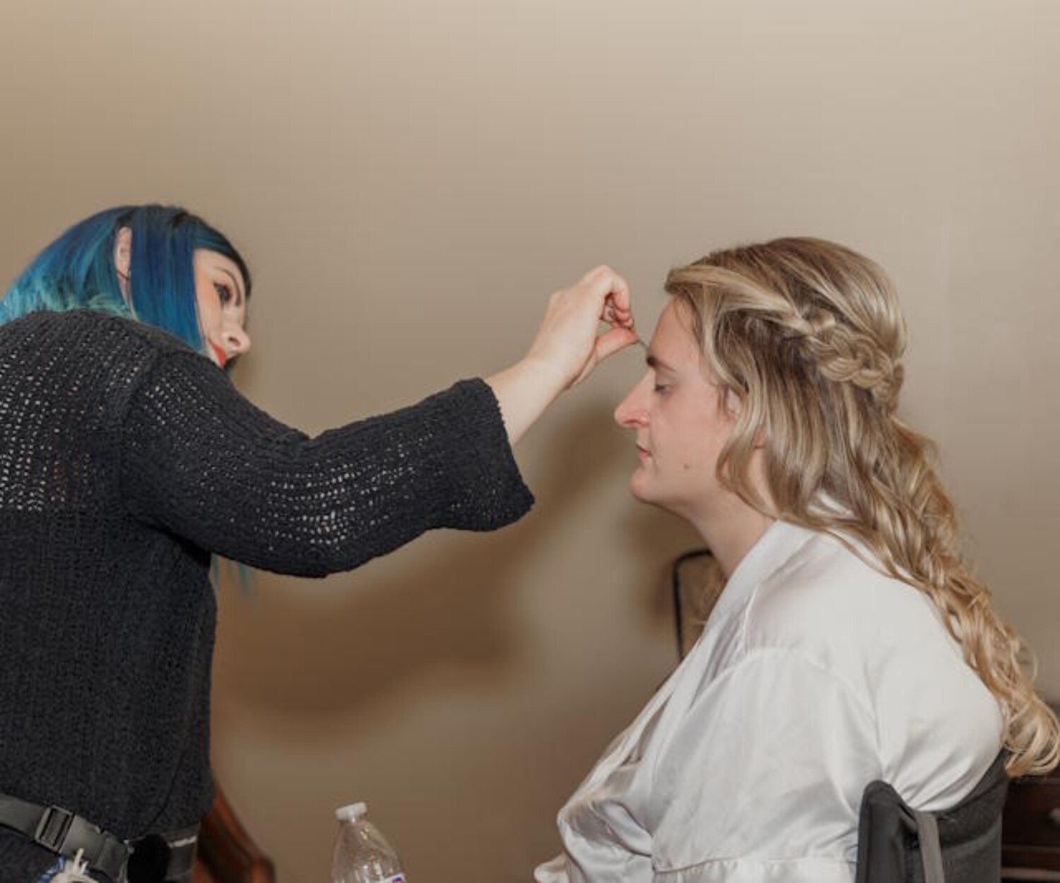Bride sitting calmly during her wedding morning makeup with a bridal makeup artist in Chandler AZ — Makeup by Diana